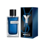 Blue Yves Saint Laurent cologne bottle with a black cap beside its blue box featuring a large YSL logo.