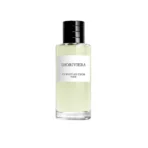 Dioriviera perfume bottle by Christian Dior with pale yellow liquid and black cap against white background, label visible