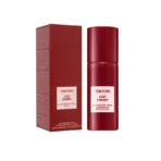 Tom Ford Lost Cherry all-over body spray bottle with red packaging and matching box on white background.