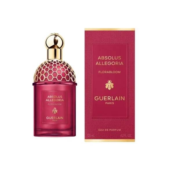 Guerlain Absolus Allegoria Florabloom perfume bottle beside its pink box with gold accents, labeled Absolus Allegoria and Guerlain Paris